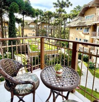 Carniel Apartamento | Alto Padrão com lareira, piscina e vista incrível