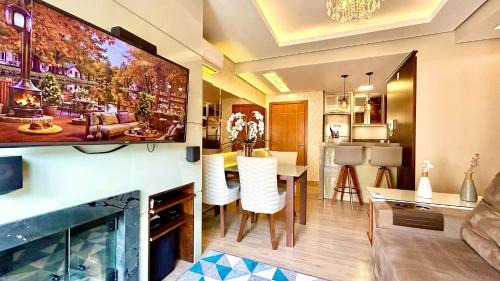 Carniel Apartamento | Alto Padrão com lareira, piscina e vista incrível