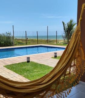 Itacimirim Apartamento | Amável Village de 2 suites, pé na areia em Itacimirim, Praia do Forte, Bahia