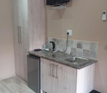 Klerksdorp Casa | AMANI PALMS GUEST HOUSE