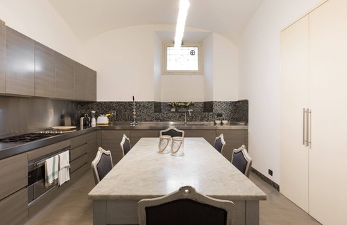Prati Apartamento | Increíble apartamento con jardín privado cerca del río.