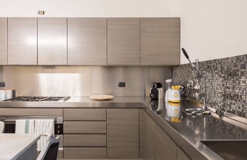 Prati Apartamento | Increíble apartamento con jardín privado cerca del río.