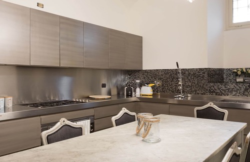 Prati Apartamento | Increíble apartamento con jardín privado cerca del río.
