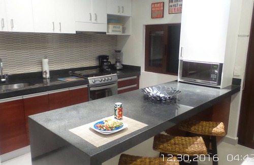 Akumal Condominio | Increíble loft Tao con vistas al campo de golf.