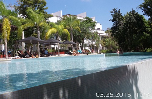 Akumal Condominio | Increíble loft Tao con vistas al campo de golf.