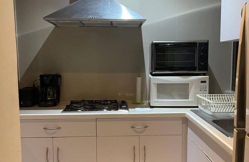 Luis Donaldo Colosio Condominio | Amazing two bedroom condo steps from the beach