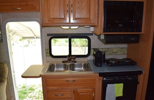 Villars-le-Grand Casa | American Ford Hurricane motorhome, with slide.