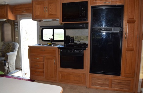 Villars-le-Grand Casa | American Ford Hurricane motorhome, with slide.