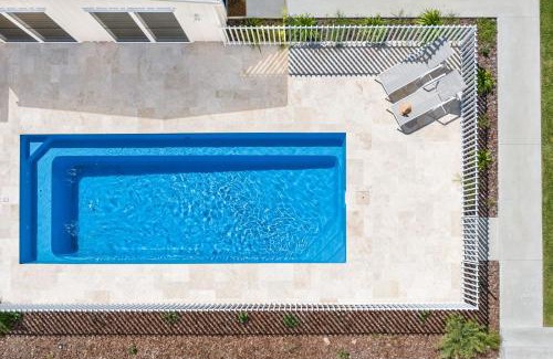 Agnes Water Casa | Amira Beach House - air conditioned, pool, walk to beach & cafes