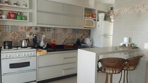 Laguna Apartamento | AMPLA COBERTURA NA PRAIA DO MAR GROSSO LAGUNA