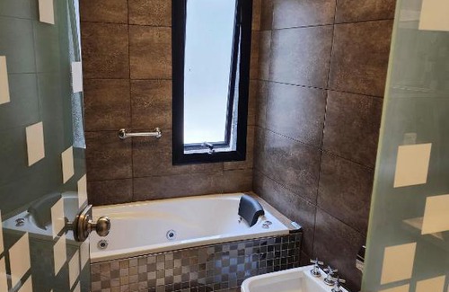 Villa Carlos Paz Apartamento | Amplio departamento frente al lago-seguridad 24hs