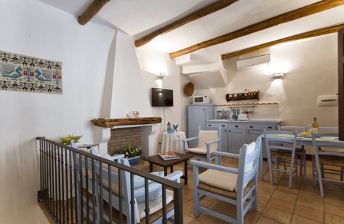 Baunei Casa | Casas de piedra antiguas: Color'e Cielu