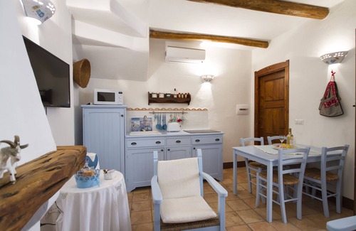 Baunei Casa | Casas de piedra antiguas: Color'e Cielu