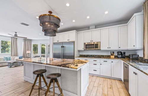 Bradenton Beach Casa | Anna Maria Grand: Gulf Front! On the Beach! Sleeps 22 by Anna Maria Life Vacation Rentals