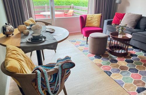 Spiekeroog Apartamento | Antares Spiekerooger Gästehaus-Sonnengartenterrasse West - Wohnung 2