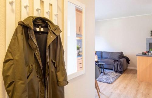 Spiekeroog Apartamento | Antares Spiekerooger Gästehaus-Sonnengartenterrasse West - Wohnung 2