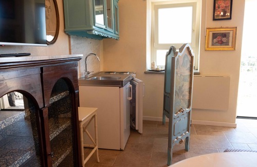 Ottiglio Apartamento | Antique Treasures Suite
