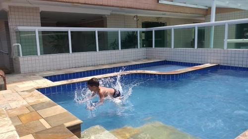 Aviacao Apartamento | Apê Temporada II Praia Grande SP Completo com Piscina, Churrasqueira, Estacionamento