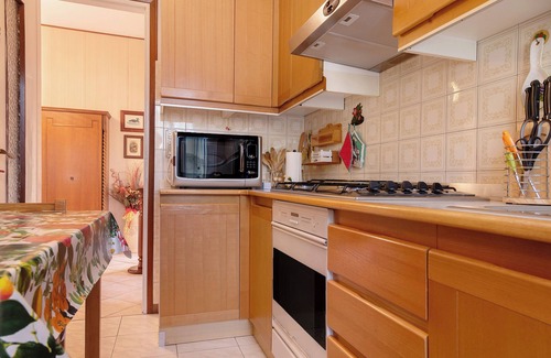 Maccagno Apartamento | Apartamento 'Casa Rosanna - Vista Lago' con vistas al lago, jardín compartido y balcón