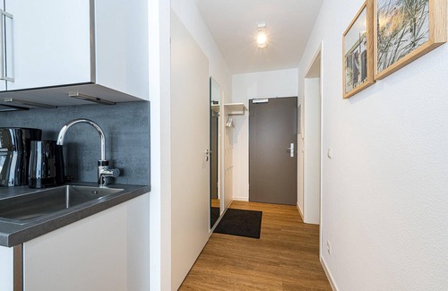 Bensersiel Apartamento | Apartment Nahe der Nordsee mit Terrasse, Parkplatz, Schwimmbad- & Saunanutzung