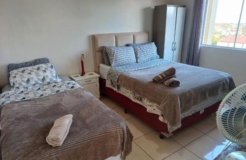 Santo Angelo Apartamento | Apart próximo a Unimed, Catedral e HSA de 2 quartos com AR, mini-Academia e garagem no Centro-sul