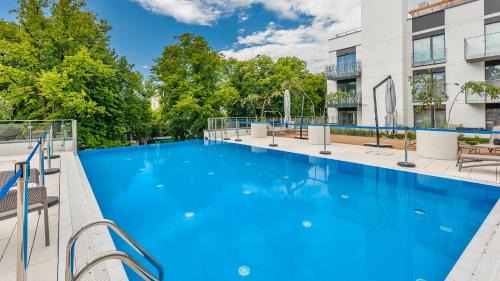 Dzielnica Uzdrowiskowa Apartamento | Apartament A215 - Parking Bawialnia Basen Fitnes w CENIE - Nadmorskie Tarasy - Holiday City