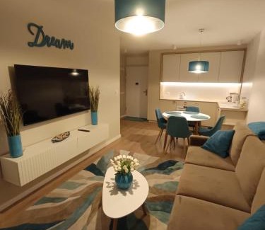 Dzielnica Uzdrowiskowa Apartamento | Apartament Whiteblue Dream 2 Kołobrzeg z ogródkiem & sauna & fitness & bawialnia dla dzieci
