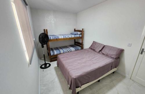 Passo de Torres Apartamento | Apartamento-3 pé na areia, churrasqueira, acesso a lagoa, vista para rio, Torres e serra gaúcha