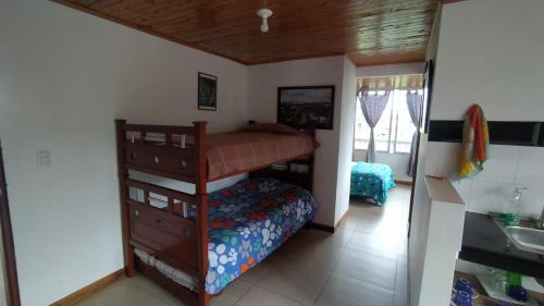 Calarca Apartamento | Apartamento acogedor, 1 habitación, cocina, comedor, vista a zonas verdes, English