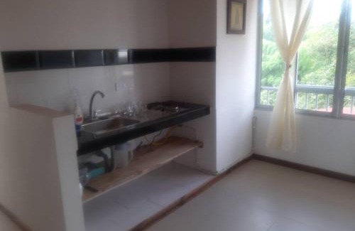 Calarca Apartamento | Apartamento acogedor, 1 habitación, cocina, comedor, vista a zonas verdes, English