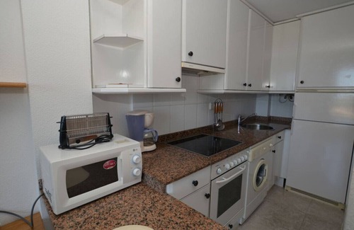 Isla Apartamento | Apartamento con vistas a la playa y tenis - la Are