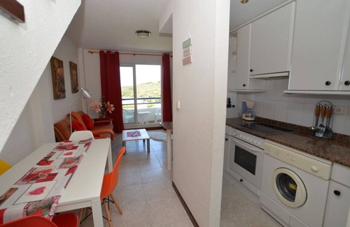 Isla Apartamento | Apartamento con vistas a la playa y tenis - la Are