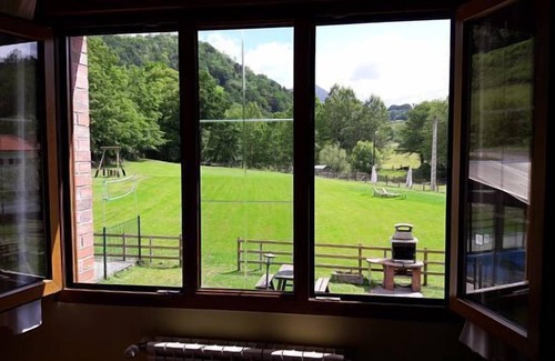 Corao Apartamento | Estudio para 2 personas con vistas al jardín.