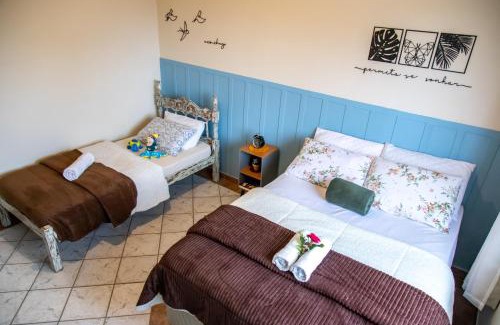 Laguna Apartamento | Apartamentos exclusivos e equipado com varanda ou terraço com Pôr do sol, cozinha privativa, Wi-Fi 600MBs, a 700m da praia de Itapirubá e 1km da BR-101