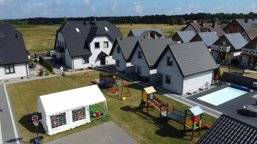 Nowecin Apartamento | Apartamenty Maja -Pokoje - Domy wakacyjne -Basen Podgrzewany -Jacuzzi