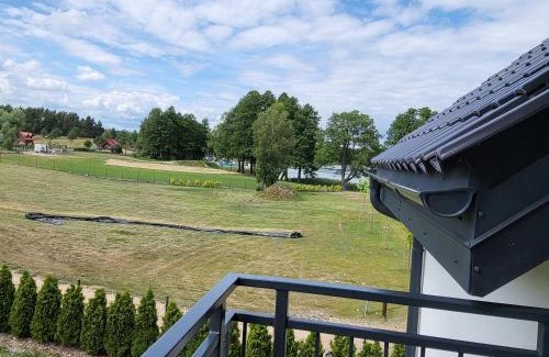 Faszcze Apartamento | APARTAMENTY SKORUPKI-Mazury Mikołajki