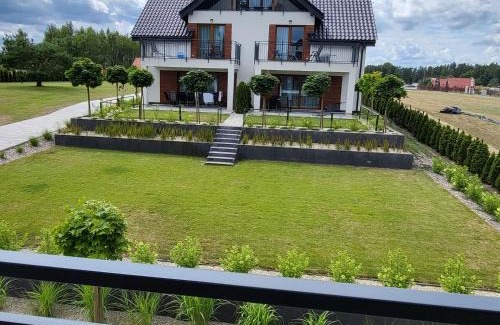 Faszcze Apartamento | APARTAMENTY SKORUPKI-Mazury Mikołajki