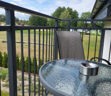 Faszcze Apartamento | APARTAMENTY SKORUPKI-Mazury Mikołajki