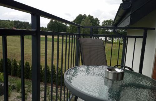 Faszcze Apartamento | APARTAMENTY SKORUPKI-Mazury Mikołajki