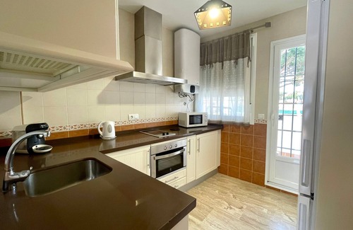 Poblado de Sancti Petri Apartamento | Apartamento Castillo de Mar, piscina y parking