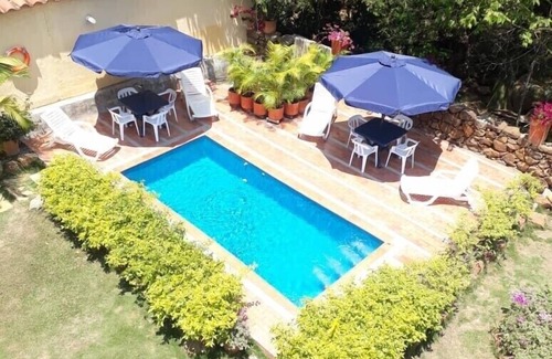 Barichara Apartamento | APARTAMENTO103.VISTAS PISCINA, PEQUEÑO ARROYO.EL RETIRO BARICHARA.