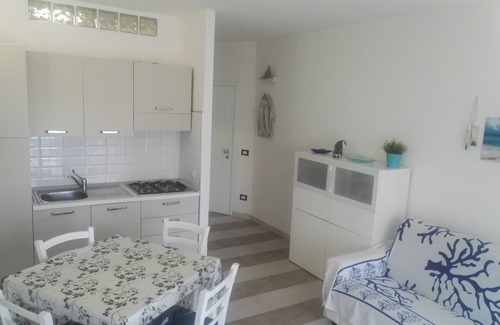 Porto San Paolo Apartamento | Apartamento a 250 metros del mar completamente reformado con jardín privado.