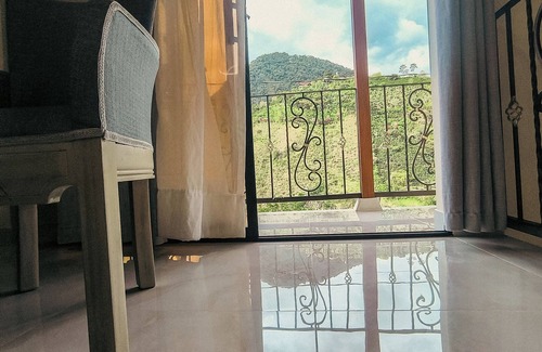 Jardin Apartamento | Apartamento a 5 minutos del parque con vista a las montañas.