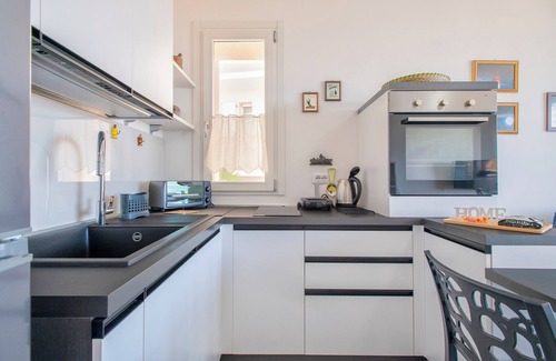 Castelsardo Apartamento | Apartamento 'Ad Occhi Aperti' con vistas al mar, Wi-Fi y aire acondicionado