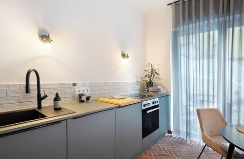 Gleisweiler Apartamento | Apartamento "Altes Pfarrhaus - das Kelterhaus" con terraza compartida y Wi-Fi