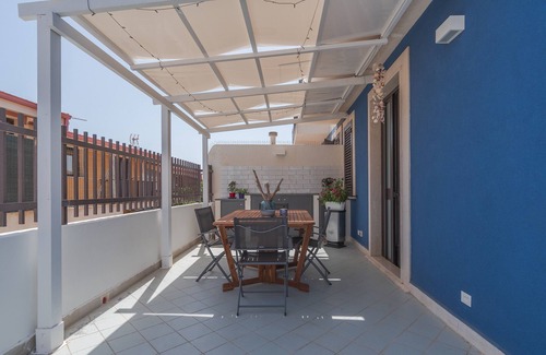 Portopalo di Capo Passero Apartamento | Apartamento "Andromeda Luxury Home" con terraza privada y Wi-Fi