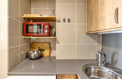 L'Escala Apartamento | Apartamento 'Apartamento Moll Con Piscina' con vistas a la montaña, piscina y aire acondicionado