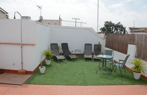 Santa Marina Apartamento | Apartamento 'Apartamento Planta Baja' con terraza compartida, Wi-Fi y aire acondicionado.