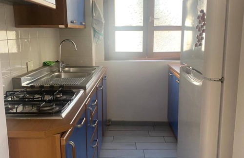 Dorgali Apartamento | Apartment 'Appartamento Trilocale 6 Posti' with Private Garden, Wi-Fi and Air Conditioning