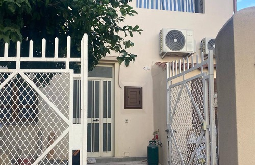 Dorgali Apartamento | Apartment 'Appartamento Trilocale 6 Posti' with Private Garden, Wi-Fi and Air Conditioning